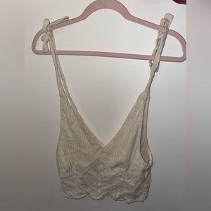 Cute beige shirt with tied straps